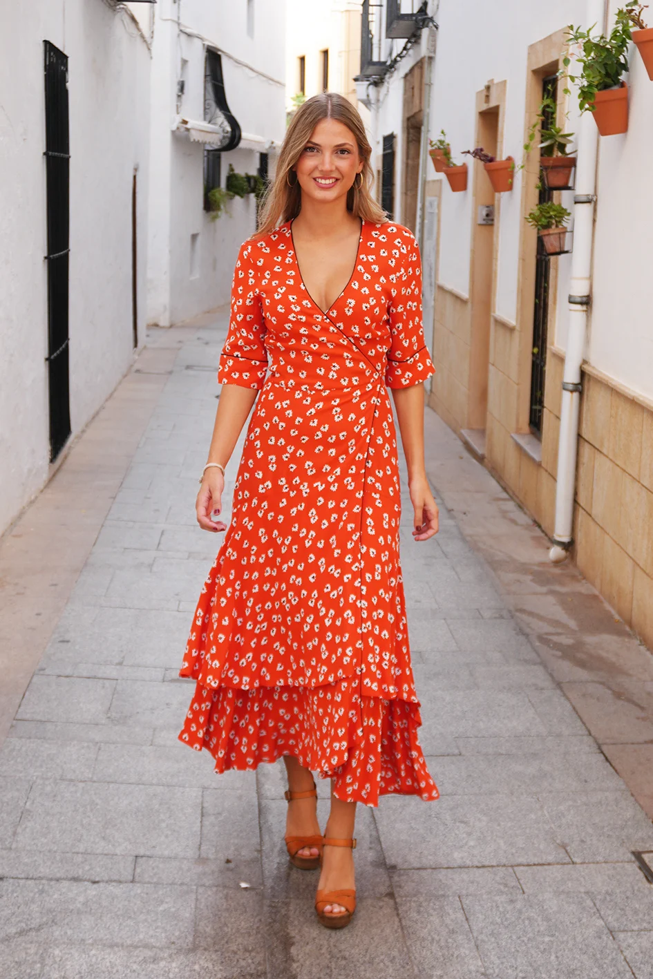 White Floral print on red dress Ganni Size S-M front walking model
