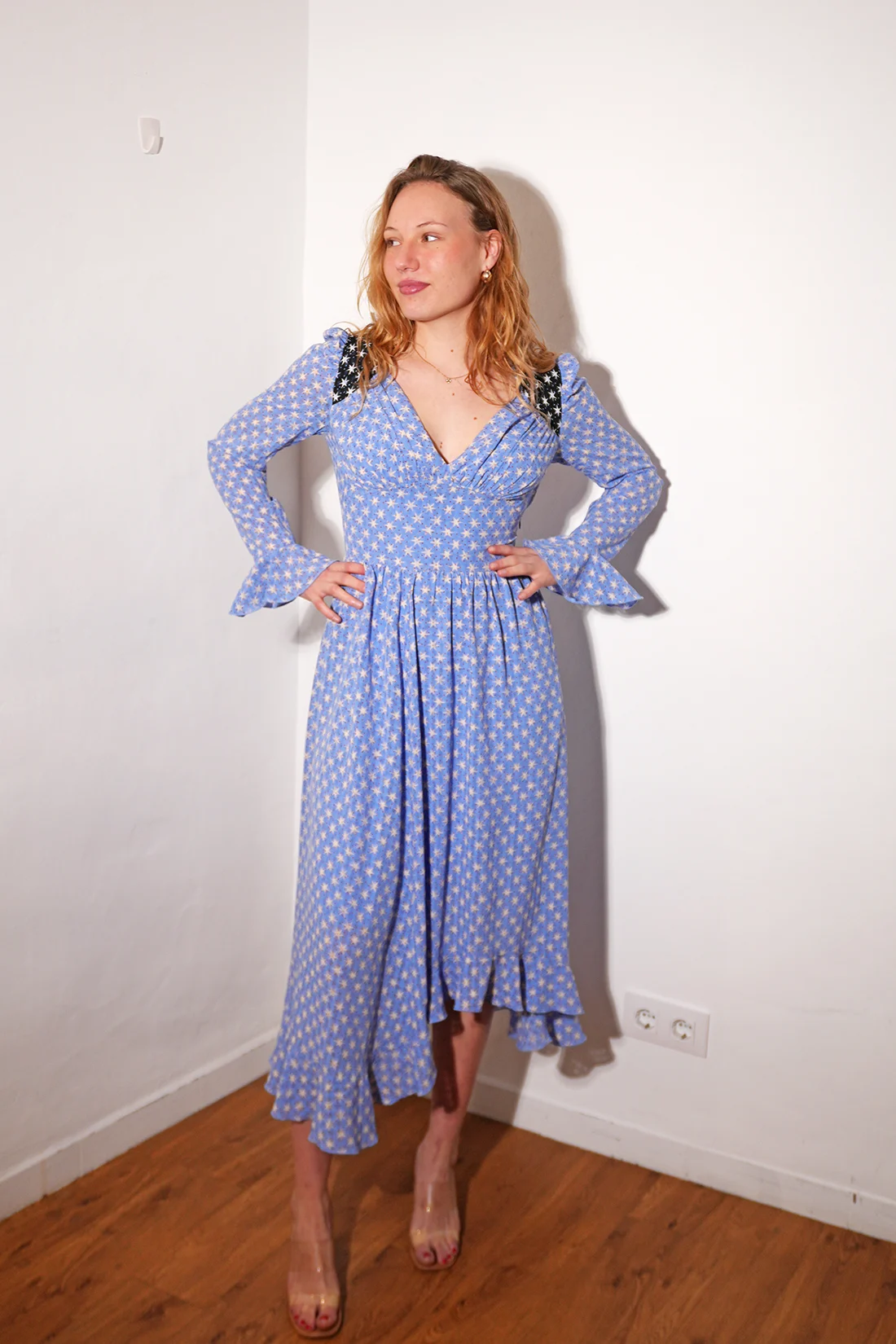 Midi dress from Stine Goya, featuring a beautiful blue pattern and black shoulders, one of the earlier pieces from stine goya front